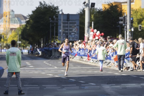 Hassan Chahdi (FRA), later in 6th place, at KM38 in front of Potsdamer Platz at the 51st BMW Berlin Marathon 2025 on 21/09/2025