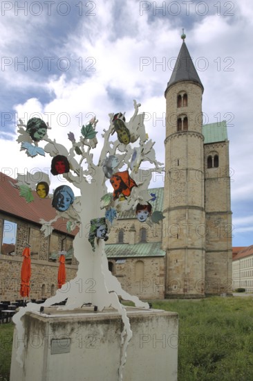 Sculpture Island of Dolls by Alicia Paz 2017, tree figure, female, faces, Modern Art, Abstract Art, Sculpture Park, Romanesque, Church, Monastery of Our Lady, Art Museum, Magdeburg, Saxony-Anhalt, Germany