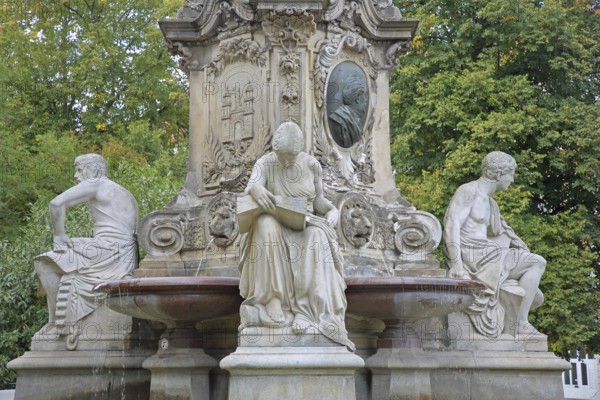 Monument to Lord Mayor Gustav Hasselbach with seated allegorical sculptures, fountain, symbol, science, knowledge, book reader, reading, figures, obelisk, Hasselbach Fountain, Haydnplatz, Magdeburg, Saxony-Anhalt, Germany