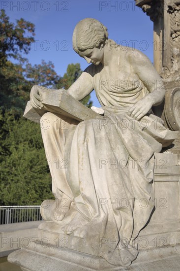 Seated white female figure reading a thick book as a symbol of science, allegory, knowledge, reading, monument to Lord Mayor Gustav Hasselbach, book reader, Hasselbach Fountain, fountain, Haydnplatz, Magdeburg, Saxony-Anhalt, Germany
