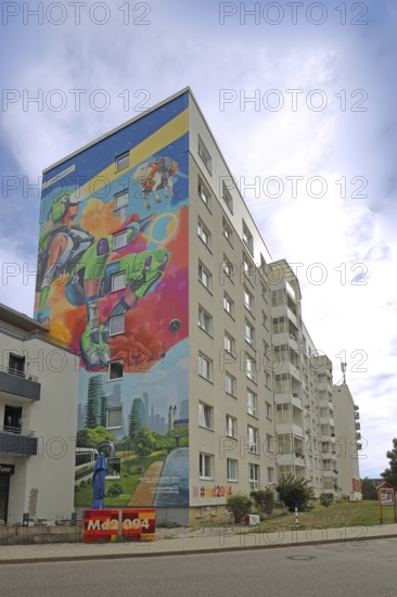 Mural md2094 by Gordon Motsch 2024, graffiti, street art, solar punk, future, futuristic, science fiction, fantasy, robot, light beam, high-rise building, Regierungsstraße, Magdeburg, Saxony-Anhalt, Germany