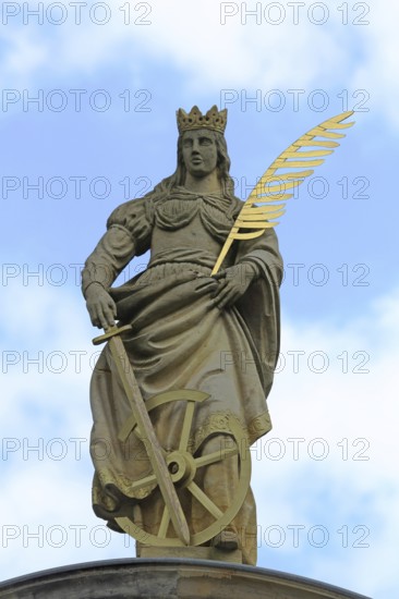 Patron saint Catherine of Alexandria with palm branch at St Catherine's portal built in 1668, Alexandria, sculpture, free-standing, monument, portal, Magdeburg, Saxony-Anhalt, Germany