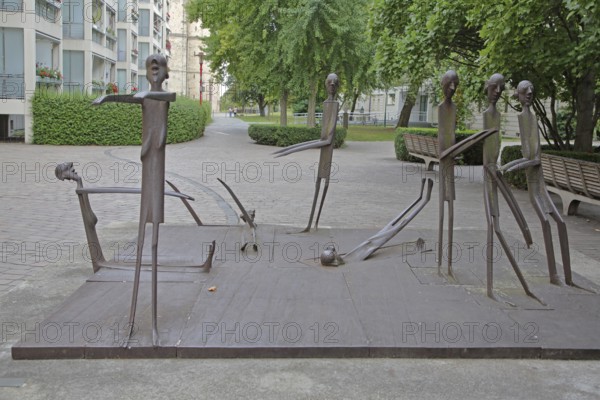 Sculpture vertschaupet II by Schang Hutter 1980, sculptures, stick figures, many, figures with slender arms and legs, thin, narrow, body, long, sculpture group, Magdeburg, Saxony-Anhalt, Germany