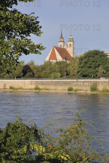 Late Romanesque St John's Church with twin towers and Elbe, Elbe riverbank, Magdeburg, Saxony-Anhalt, Germany