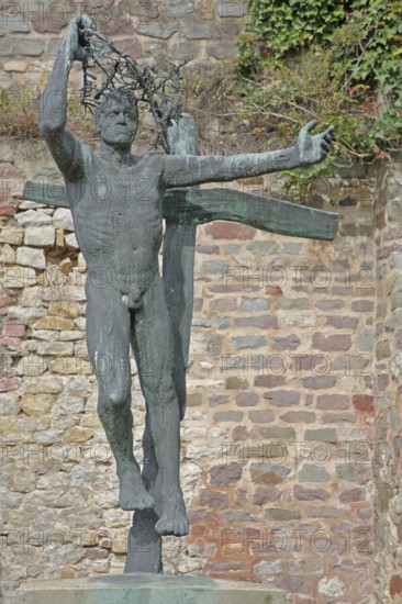 Sculpture Resurrection by Fritz Cremer 1947, naked standing male figure on the cross, death, life, resurrection, awakening, bronze sculpture, modern art, symbol, life-size, bizarre, sculpture park, Magdeburg, Saxony-Anhalt, Germany