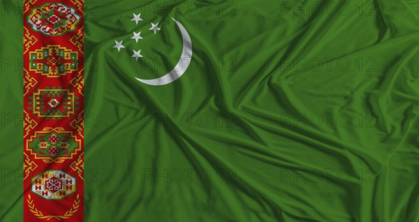 Turkmen flag with fabric texture background. National flag of Turkmenistan with cloth texture