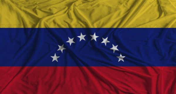 Venezuelan flag with fabric texture background. National flag of Venezuela with cloth texture