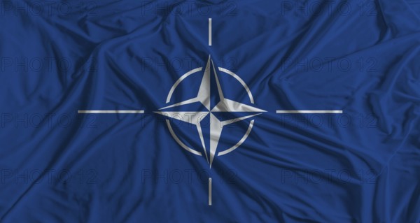 NATO flag with fabric texture background. National flag of NATO with cloth texture