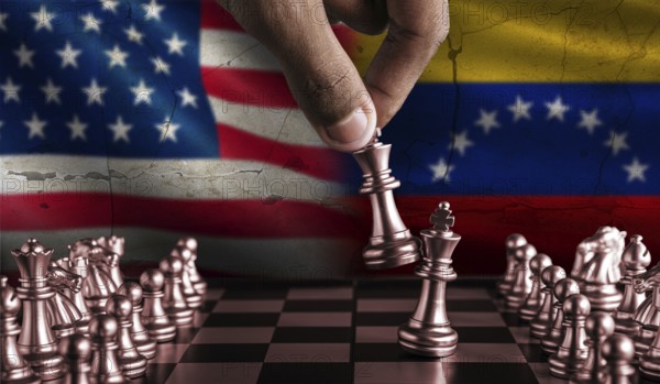 Political tension between Venezuela and USA. Venezuela vs USA flag on chessboard