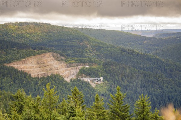 Quarry in the middle of forests under a cloudy sky, Black Forest, Seebach, Germany