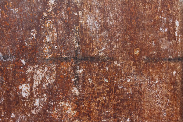 Weathered rusty metal surface in various shades of brown, Tuscany, Italy