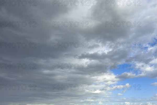 Left cold front clouds of cumulus clouds right in front altocumulus clouds and stratocumulus clouds, international