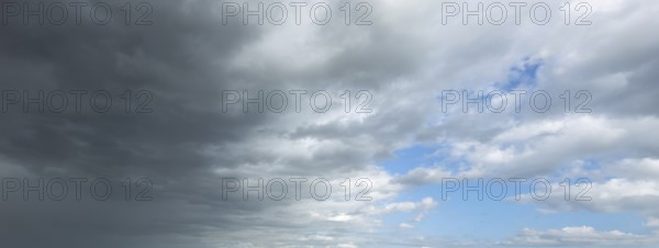 Panorama photo from left cold front clouds of cumulus clouds right in front altocumulus clouds and stratocumulus clouds, international