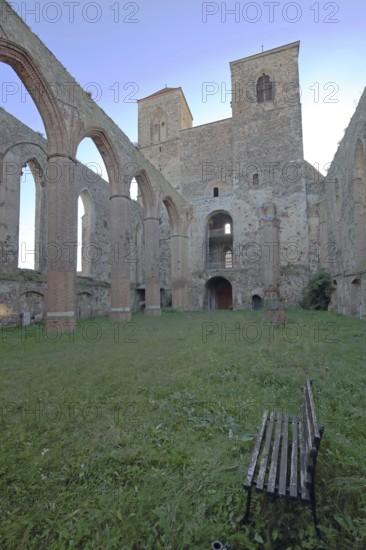 Interior view of the St. Nikolai church ruins, green lawn, nature, empty, pew, twin towers, Zerbst, Fläming, Saxony-Anhalt, Germany