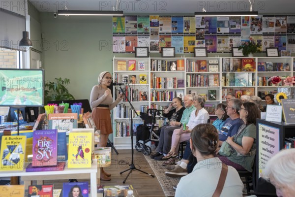 Detroit, Michigan - Melinda Billingsley, a spoken-word poet, performs her work at Next Chapter Books