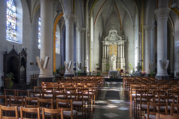 Altar of the 19th century Gothic Revival Saint Martin church in the village Beauraing, province of Namur, Wallonia, Belgium