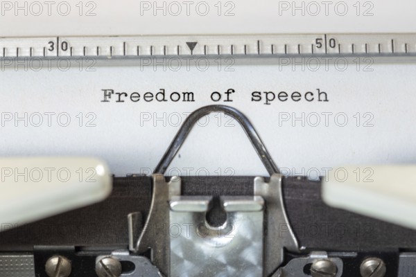 FREEDOM OF SPEECH, written with a typewriter
