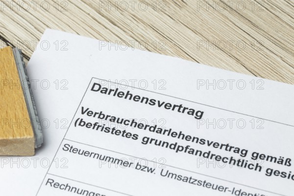 Close-up of a symbolic loan agreement