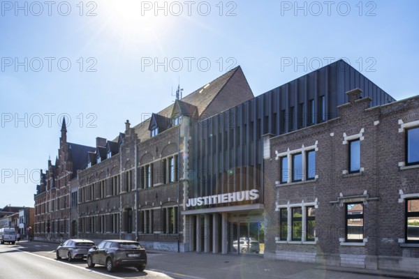 House of Justice providing legal assistance in the city centre of Dendermonde, East Flanders, Belgium. Sun flare added digitally