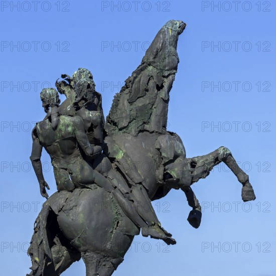 Bronze statue of the Ros Beiaard by sculptor Jan Desmarets, folkloristic horse in the city Dendermonde, East Flanders, Belgium