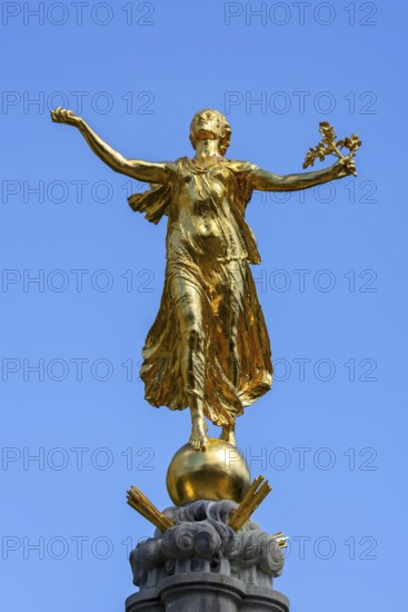World War One monument showing Nike, Greek goddess of victory near church of Our Lady ten Poel at city Tienen, Tirlemont, Flemish Brabant, Belgium