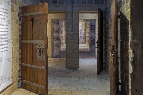 Old wooden cell doors in Het Toreke museum, former 19th century prison at the Grote Markt in the city Tienen, Tirlemont, Flemish Brabant, Belgium
