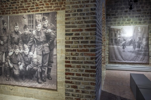 Vintage photos of WWII in Het Toreke museum, former 19th century prison at the Grote Markt in the city Tienen, Tirlemont, Flemish Brabant, Belgium