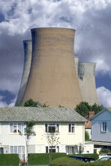 Cooling towers of a coal-fired power station next to a residential neighbourhood, Midlands, England, Great Britain