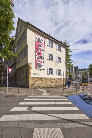 Museum Hegel-Haus, historical building, pedestrian crossing, zebra crossing, general architecture, trees, cloudy, diffuse light, slightly sunny, intersection Eberhardstraße with Torstraße, Stuttgart, state capital, city district Stuttgart, Baden-Württemberg, Germany