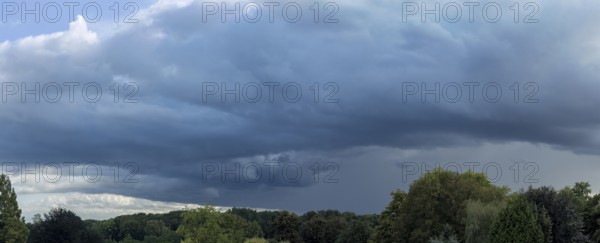 Gathering low pressure area with rain front dark stratus clouds Nimbostratus clouds, international