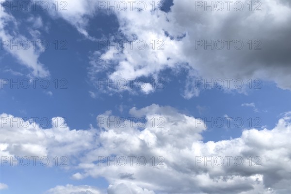 White bright cluster clouds Altocumulus under blue sky, international