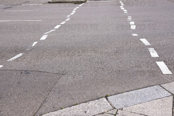 Displaced road markings, symbolic image of need for renovation, Germany