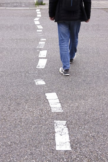 Displaced road markings, symbolic image of need for renovation, Germany