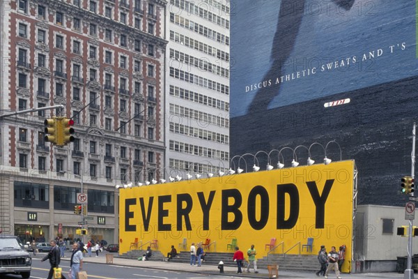 Street scene with large billboard Everybody, New York City, USA