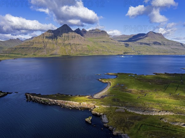 Mountains, morning light, fjord, coast, summer, aerial view, Berufjördur, behind it Teigarhorn, East Fjords, Iceland