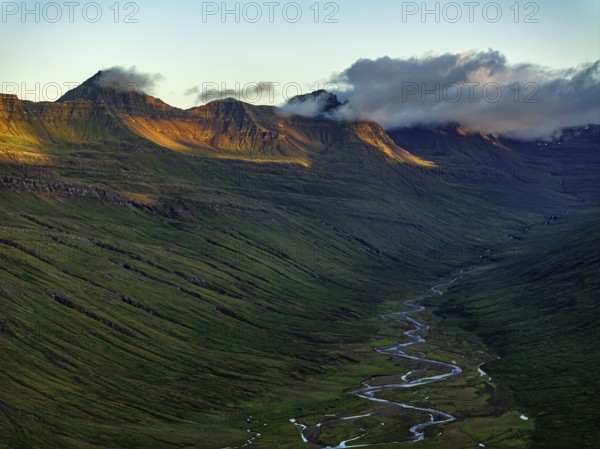 Mountains, morning light, valley, river, river course, river delta, coast, aerial view, summer, Stodvarfjördur, East Fjords, Iceland