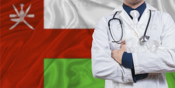 Male doctor with stethoscope on Maldivian flag. Doctor holding stethoscope on Maldives flag