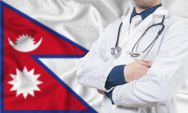 Nepal healthcare concept. Male doctor on Nepal flag. Doctor with crossed arms on Nepal flag