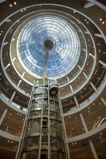 Interior view, glass dome of the Karlspassage in the Breuninger department stores', shopping centre, lift, Stuttgart, Baden-Württemberg, Germany