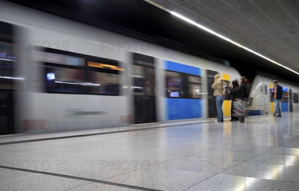 Underground incoming S-Bahn, train, Class 420 Generation 2025, platform, passengers, travellers, stop, Stadtmitte station, public transport, movement effect, Stuttgart, Baden-Württemberg, Germany