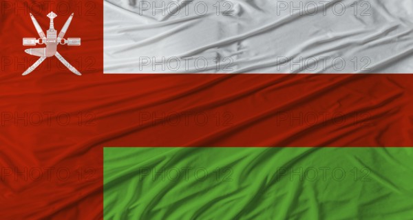 Close up of Oman flag waving. Flag of Oman with cloth texture
