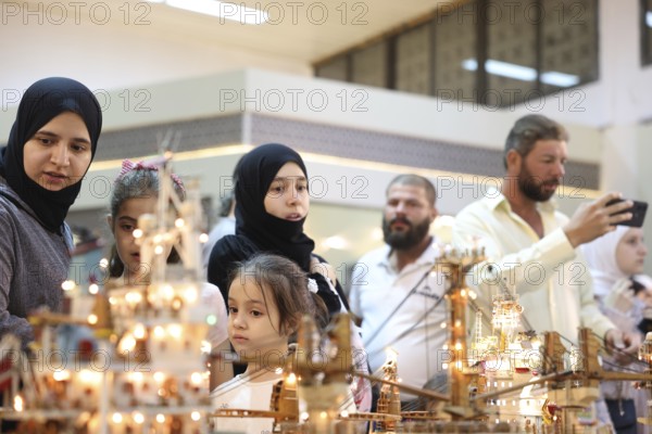 The First Damascus International Fair drew an unprecedented turnout of about 2.3 million visitors following the fall of Assad's regime. Crowds explored the diverse exhibition halls, including cultural, economic, Damascus, Damascus, Syria