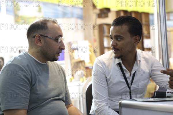 Syrian participants showcase small robots during the Damascus International Fair. The display highlights new technology projects and innovation initiatives presented to visitors at the exhibition, Damascus, Damascus, Syria