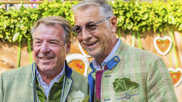The folk musician Patrick Lindner with man Peter shepherd, Oktoberfest, Munich, Upper Bavaria, Bavaria, Germany