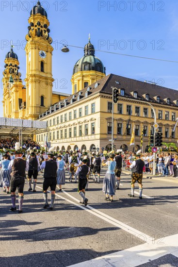 A brass band marches in the direction of the Theatiner church, Trachten- und Schützenzug, Oktoberfest, Munich, Upper Bavaria, Bavaria, Germany