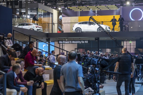 Volkswagen exhibition stand. IAA MOBILITY in Munich. The motor show presents itself as a holistic mobility trade fair. But cars are still the centre of attention. Munich, Bavaria, Germany