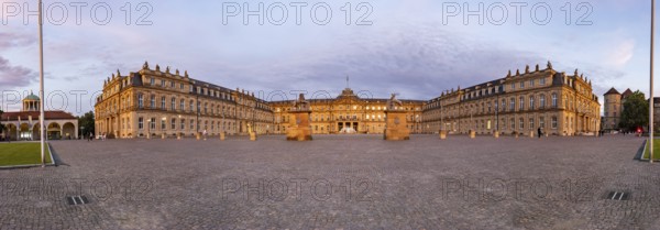 Evening atmosphere at Schlossplatz Stuttgart. View of the New Palace. Panoramic photo. Stuttgart, Baden-Württemberg, Germany