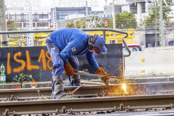 Track construction at Stuttgarter Straßenbahnen AG (SSB) near the Eszet stop. Welding rails. The rails of the U13 line are being renewed due to their age. Stuttgart, Baden-Württemberg, Germany