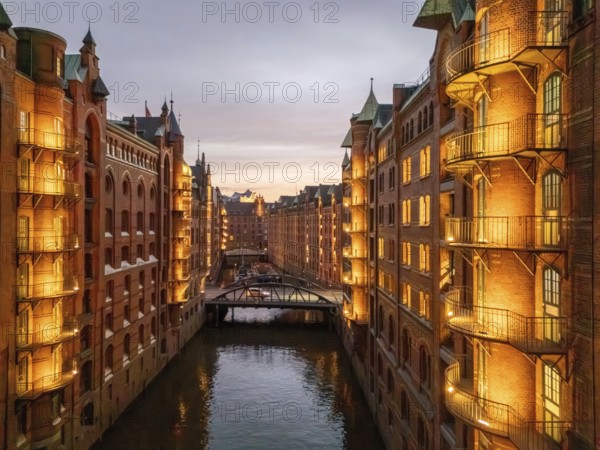 Hamburg warehouse district with evening lighting, Hamburg, Germany