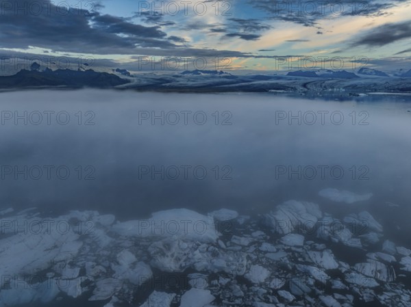 Ice floes, glacier, glacier tongue, fog, clouds, morning mood, reflection, aerial view, summer, glacier lagoon, Jökulsarlon, Vatnajökull, Iceland